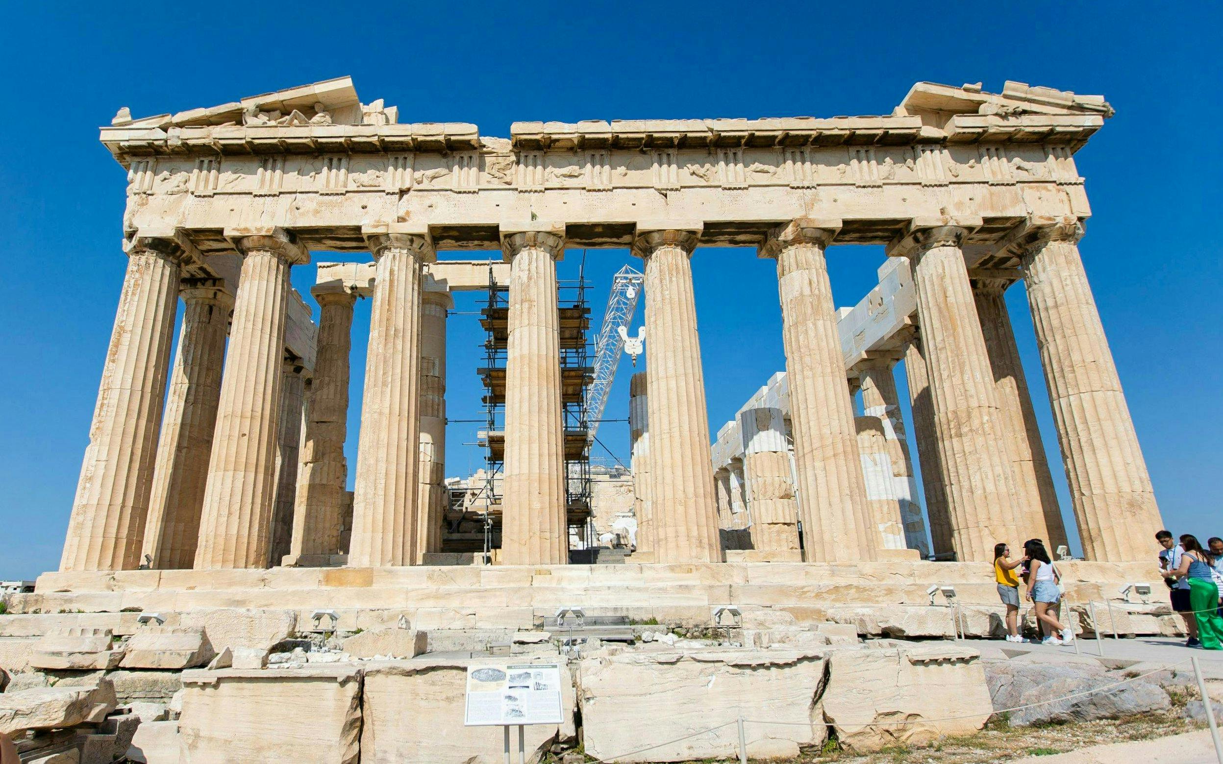 Parthenon on Acropolis with tourists, Athens guided tour.