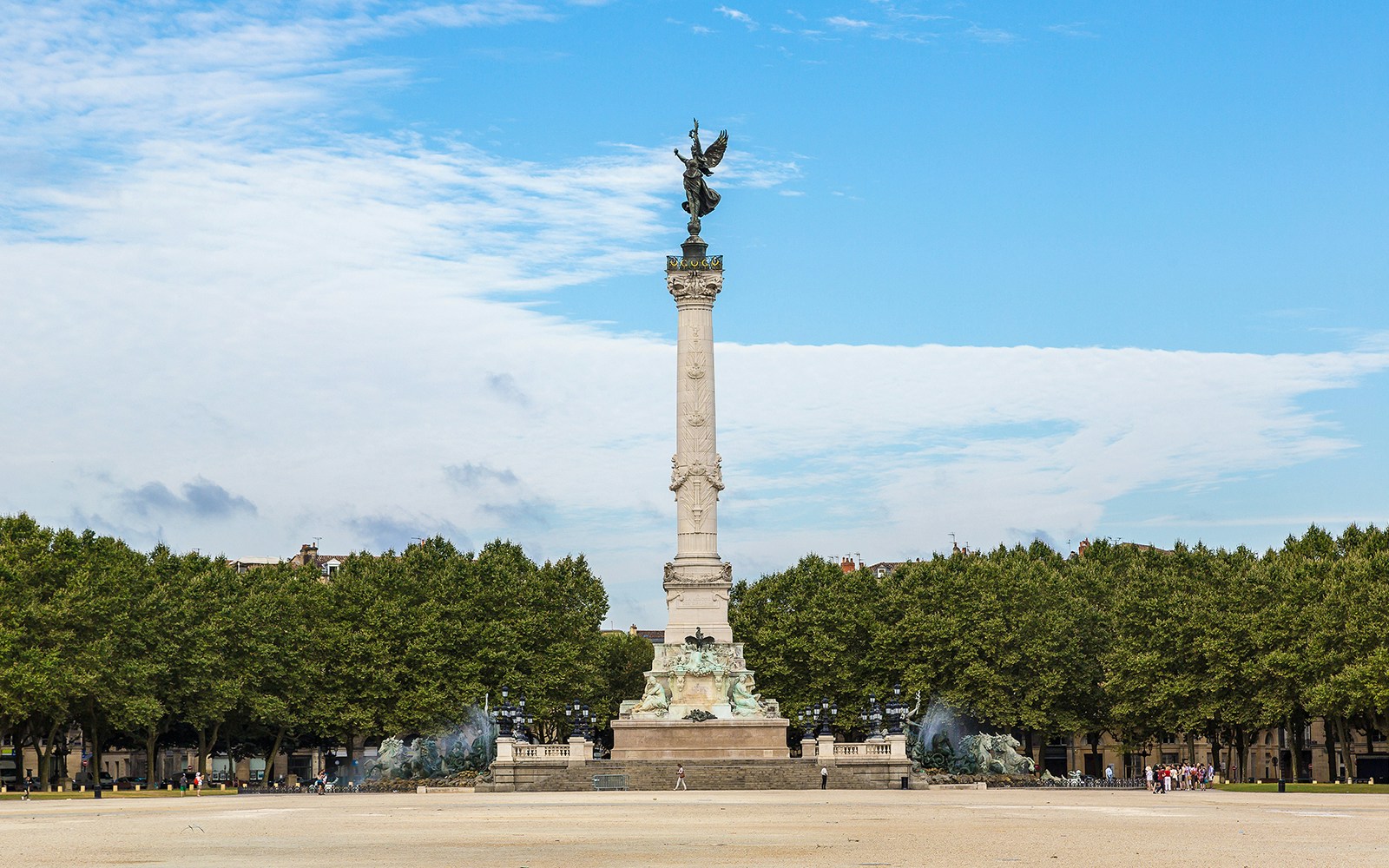 Monument aux Girondins in Bordeaux, France, with fountain and column topped by a statue.
