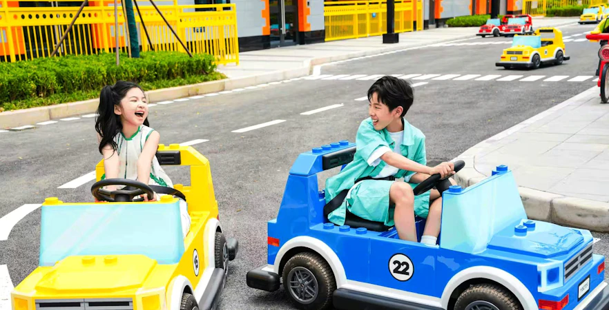 Children driving LEGO cars at LEGOLAND® Shanghai Resort.