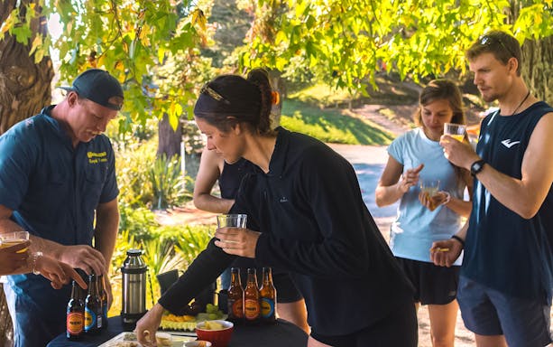 Guests enjoying refreshments before the Evening Glowworm Kayak Guided Tour in Tauranga.