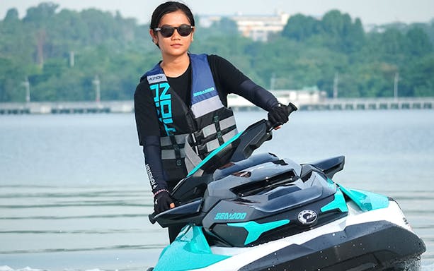 Person riding a Seadoo on a safari tour in Johor Bahru.