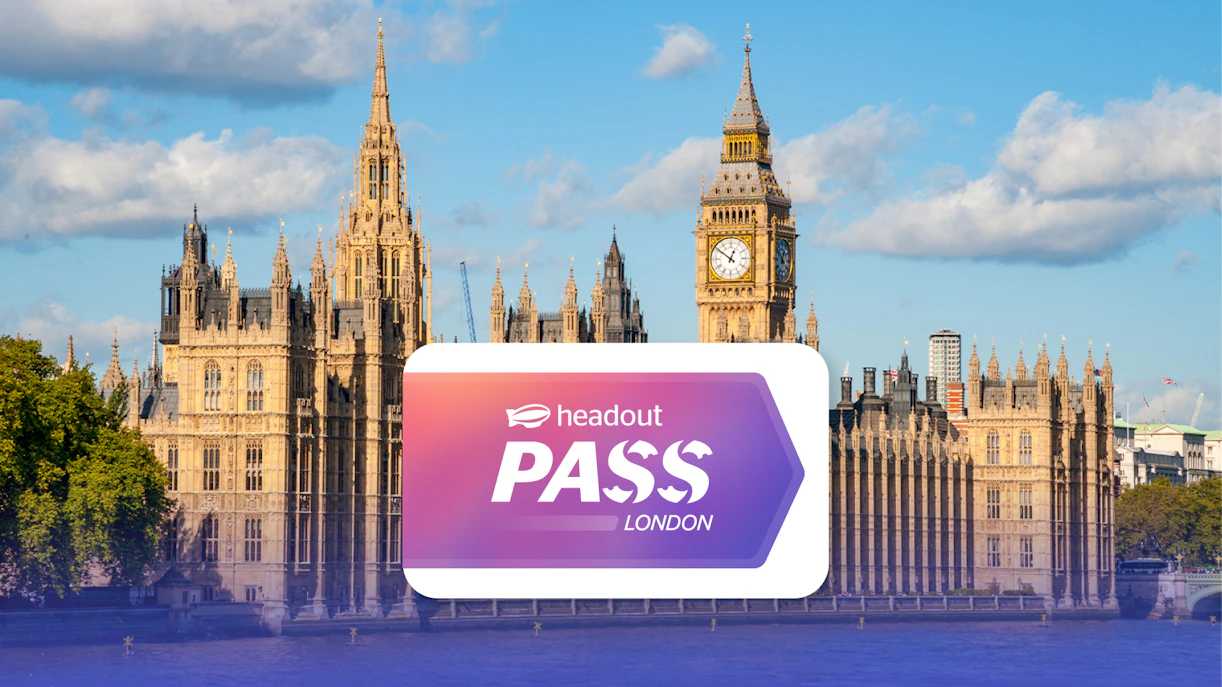 Houses of Parliament and Big Ben by the River Thames in London with Headout Pass logo.