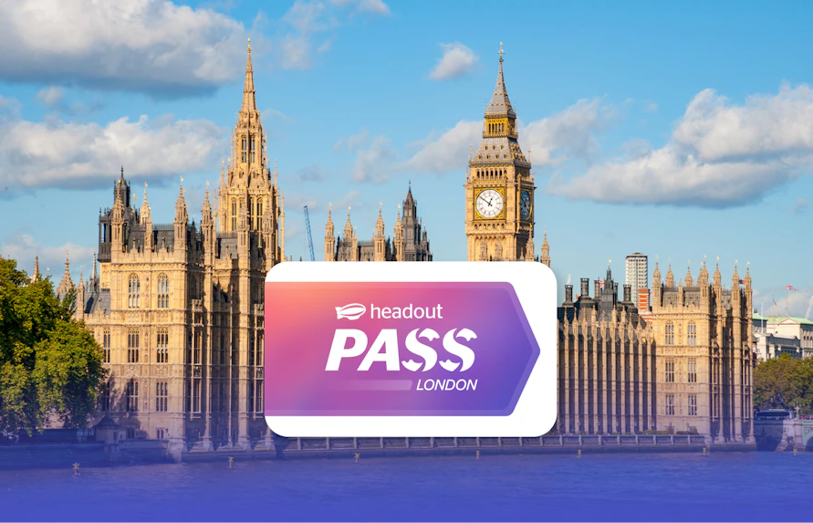 Houses of Parliament and Big Ben by the River Thames in London with Headout Pass logo.
