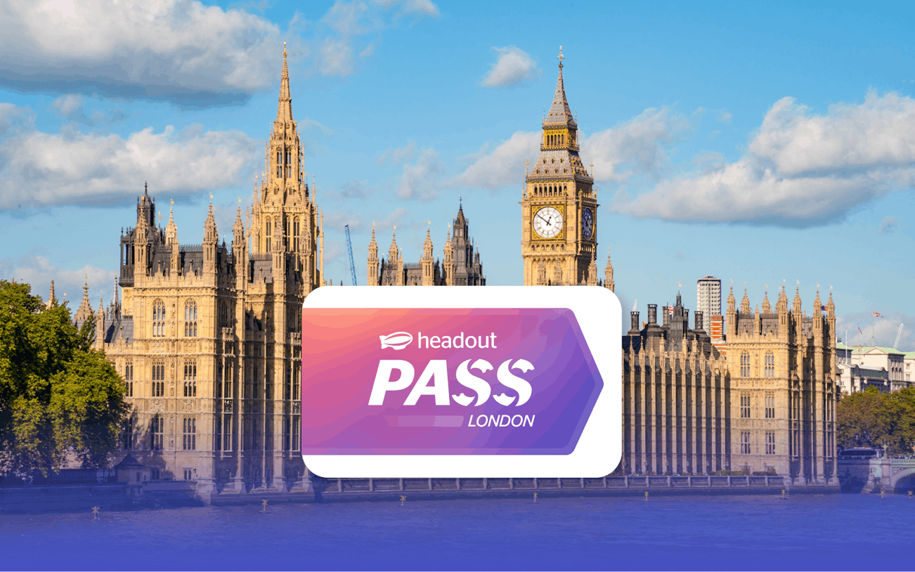 Houses of Parliament and Big Ben by the River Thames in London with Headout Pass logo.
