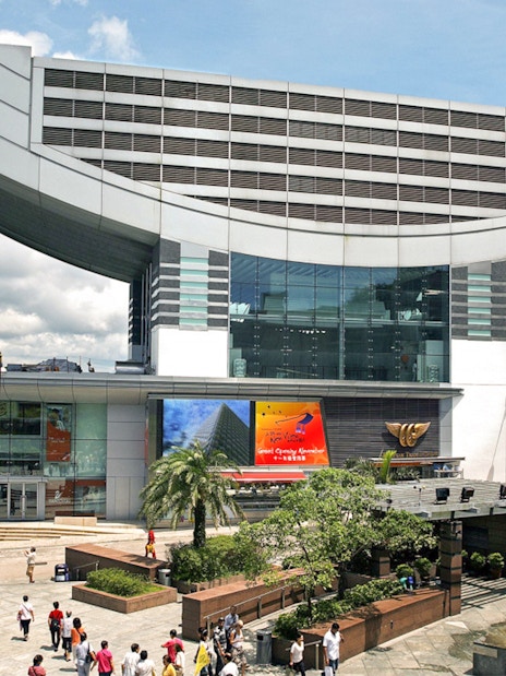 Sky Terrace 428 entrance at The Peak, Hong Kong, with visitors exploring the area.
