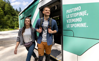 Visitors exiting a shuttle bus near Vintgar Gorge, Bled.
