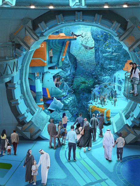 Visitors exploring underwater exhibits at Sea World Abu Dhabi.