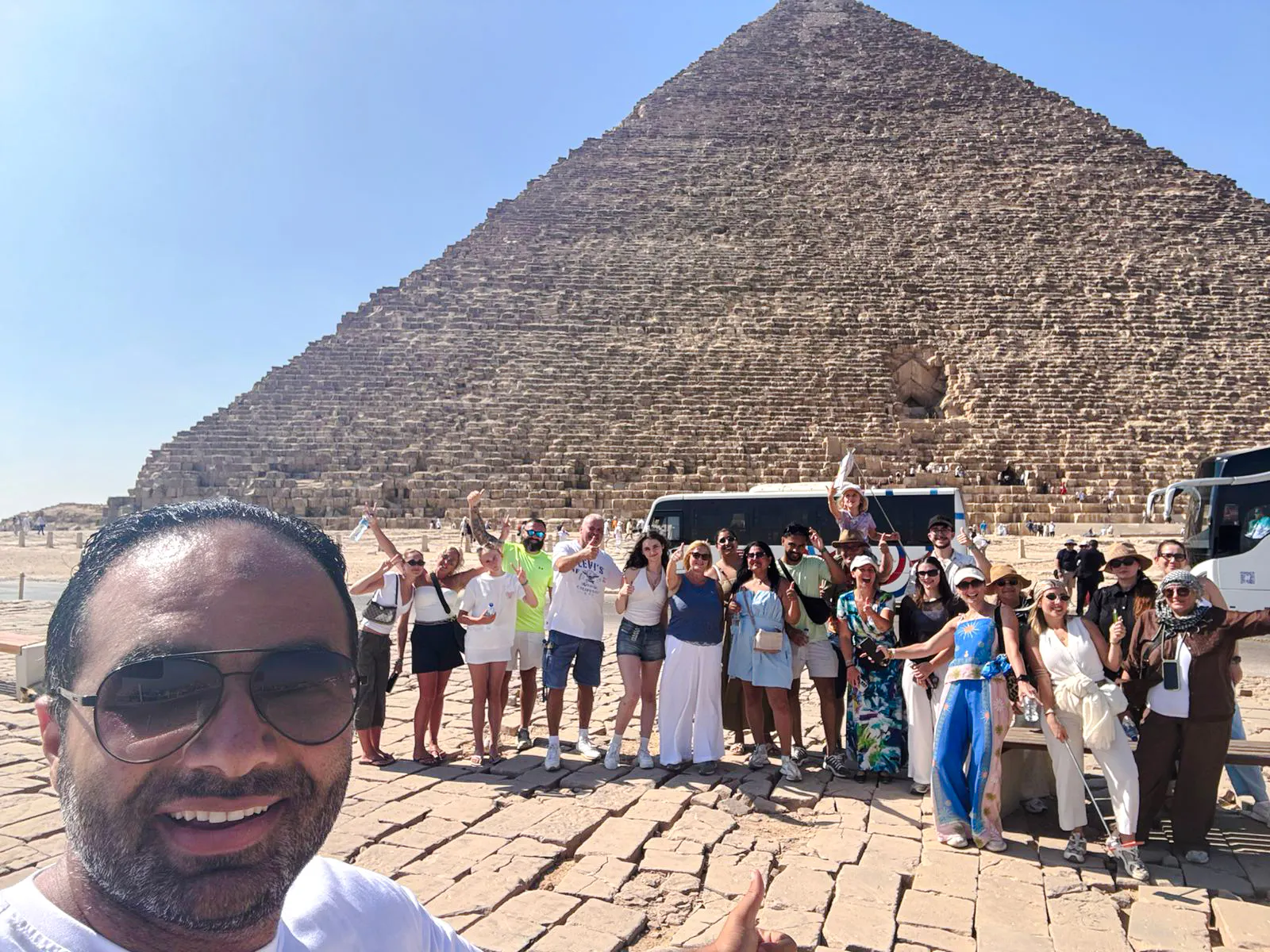 Tour group in front of the Pyramid of Giza during a private tour in Cairo.