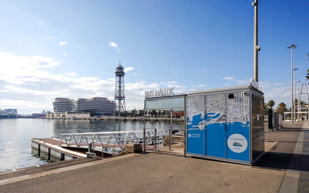 Barcelona port with Bus Nautic terminal and cable tower in view.