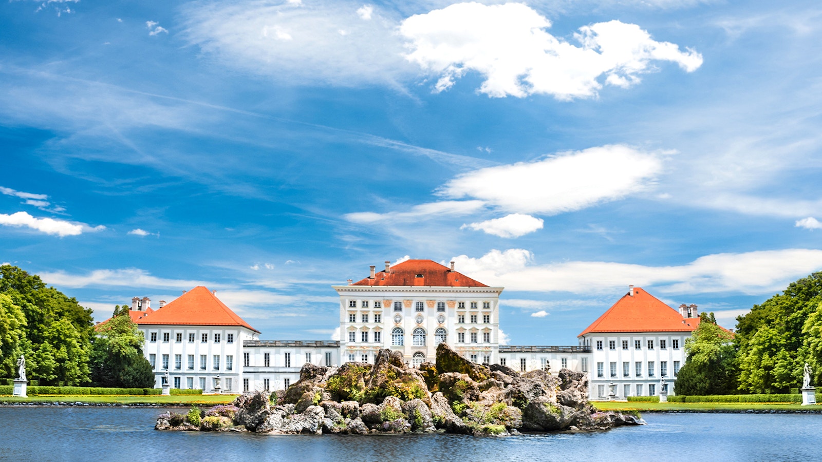 Nymphenburg Palace facade with gardens, Munich, Germany.