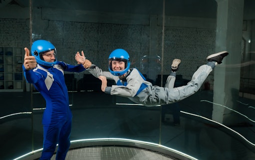 Indoor skydiving in a wind tunnel with instructor, Dubai, UAE.