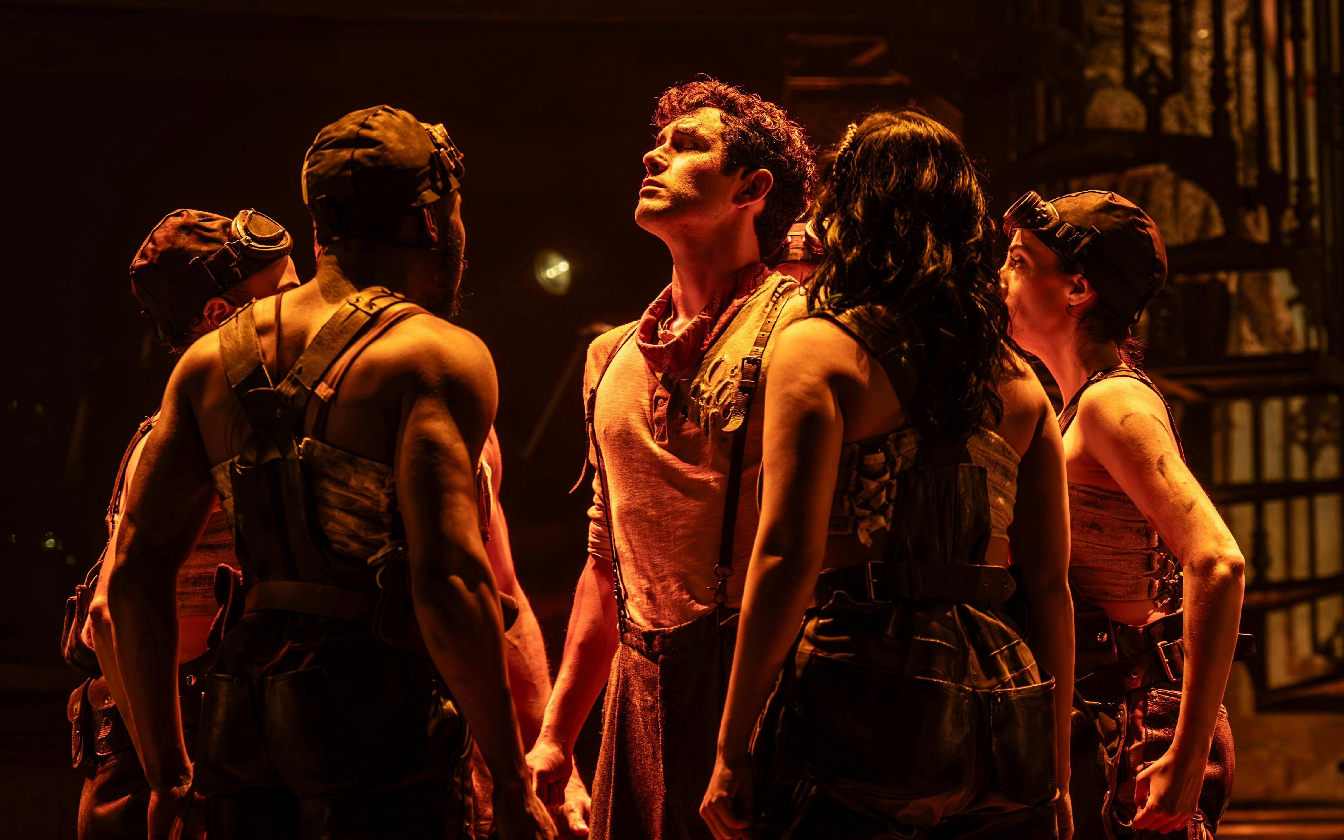 Performers on stage during Hadestown show, West End.