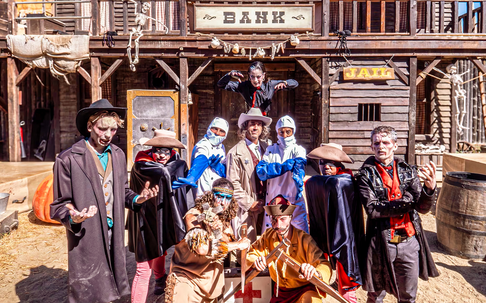 Port Aventura's West Blood Frenzy show with performers in cowboy attire on stage.