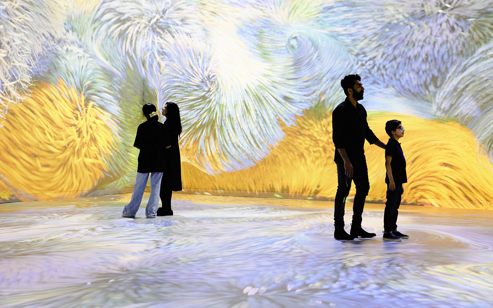 Van Gogh Remastered audiovisual experience in Rotterdam with immersive swirling colors.