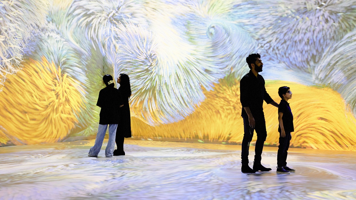 Van Gogh Remastered audiovisual experience in Rotterdam with immersive swirling colors.