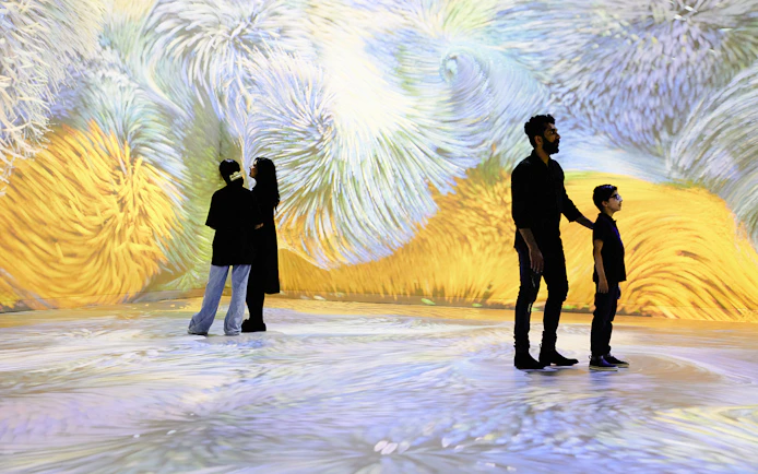 Van Gogh Remastered audiovisual experience in Rotterdam with immersive swirling colors.