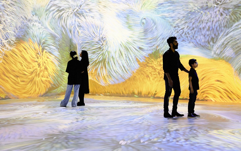 Van Gogh Remastered audiovisual experience in Rotterdam with immersive swirling colors.