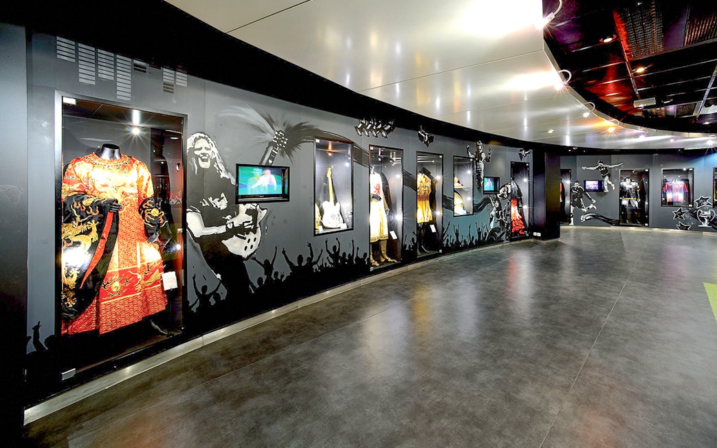 Museum exhibit with costumes and memorabilia at Stade de France, Paris.