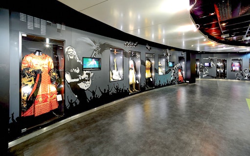 Museum exhibit with costumes and memorabilia at Stade de France, Paris.
