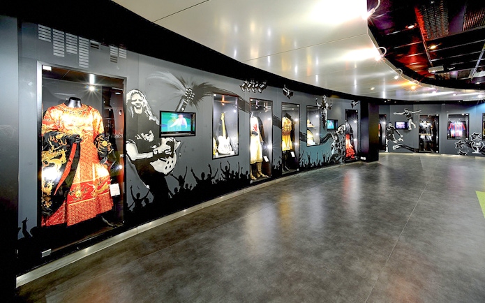 Museum exhibit with costumes and memorabilia at Stade de France, Paris.