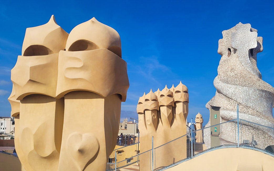 La Pedrera Casa Mila rooftop chimneys and sculptures in Barcelona.
