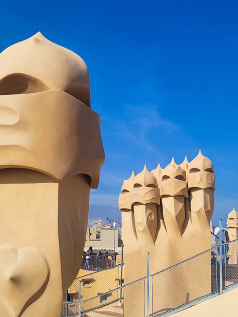 La Pedrera Casa Mila rooftop chimneys and sculptures in Barcelona.