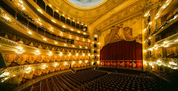 Teatro Colón's ornate interior with balconies and stage in Buenos Aires.