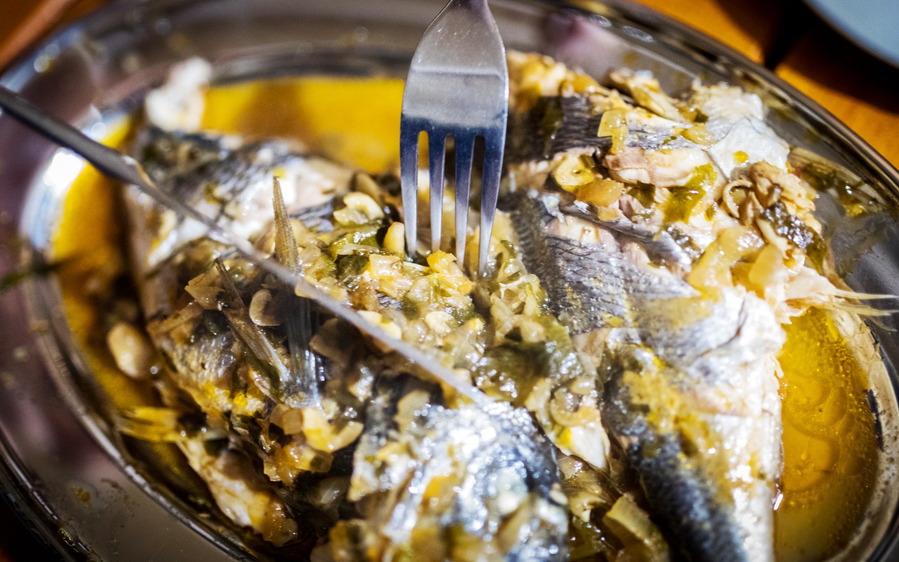 Grilled fish with herbs and vegetables on a Dubrovnik dinner cruise.
