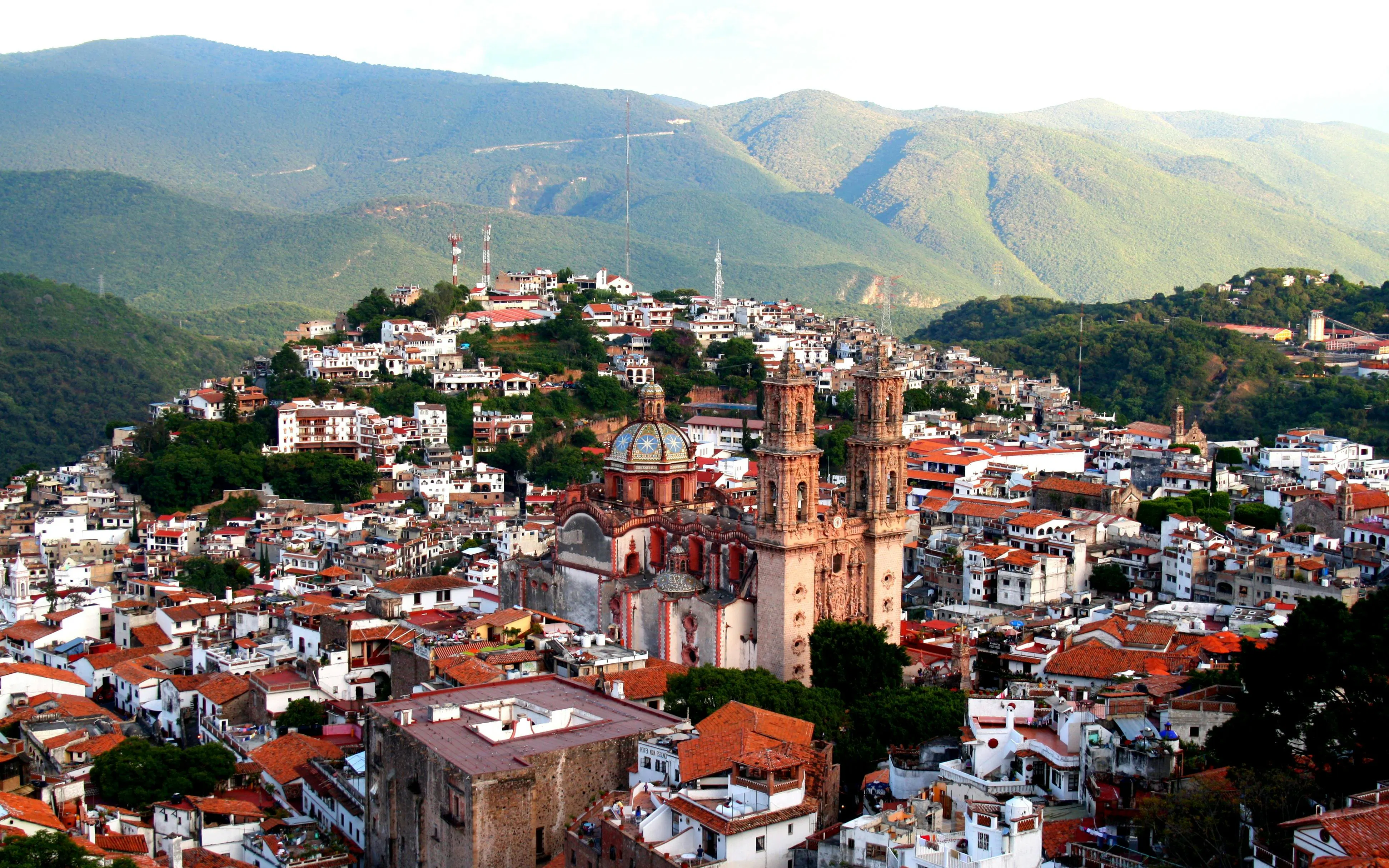 Taxco cityscape with Santa Prisca Church and surrounding hills, Mexico City: Cuernavaca & Taxco Day Tour.