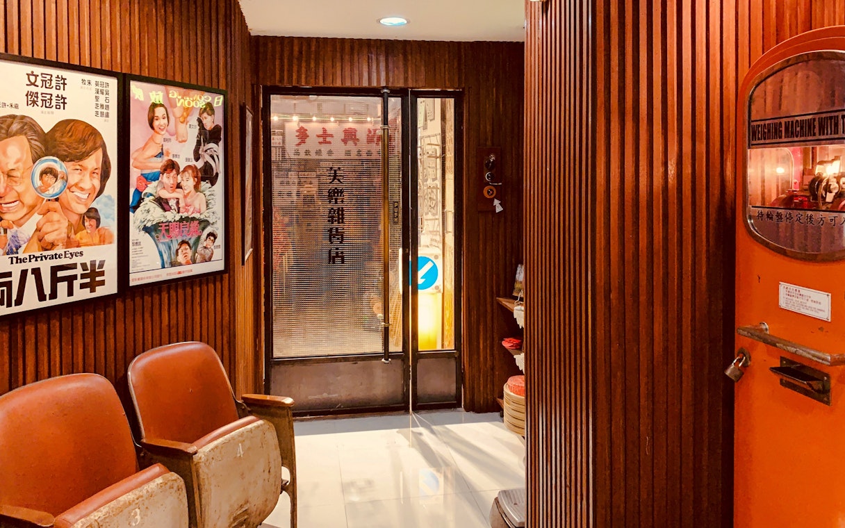 Vintage movie theatre lobby at Hong Kong Peak Tram & Sky Terrace with classic film posters.