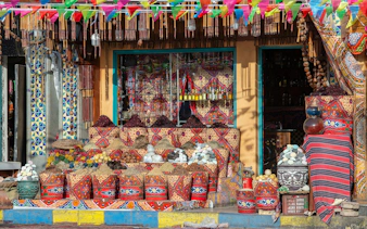 Traditional spices and herbs displayed in colorful baskets at Old Market, Sharm El Sheikh, Egypt.