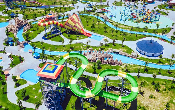 Aerial view of water slides and attractions at Vinwonders Nam Hoi An Theme Park.