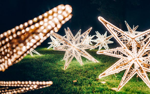 Illuminated star sculptures at Lumina Park, Budapest.