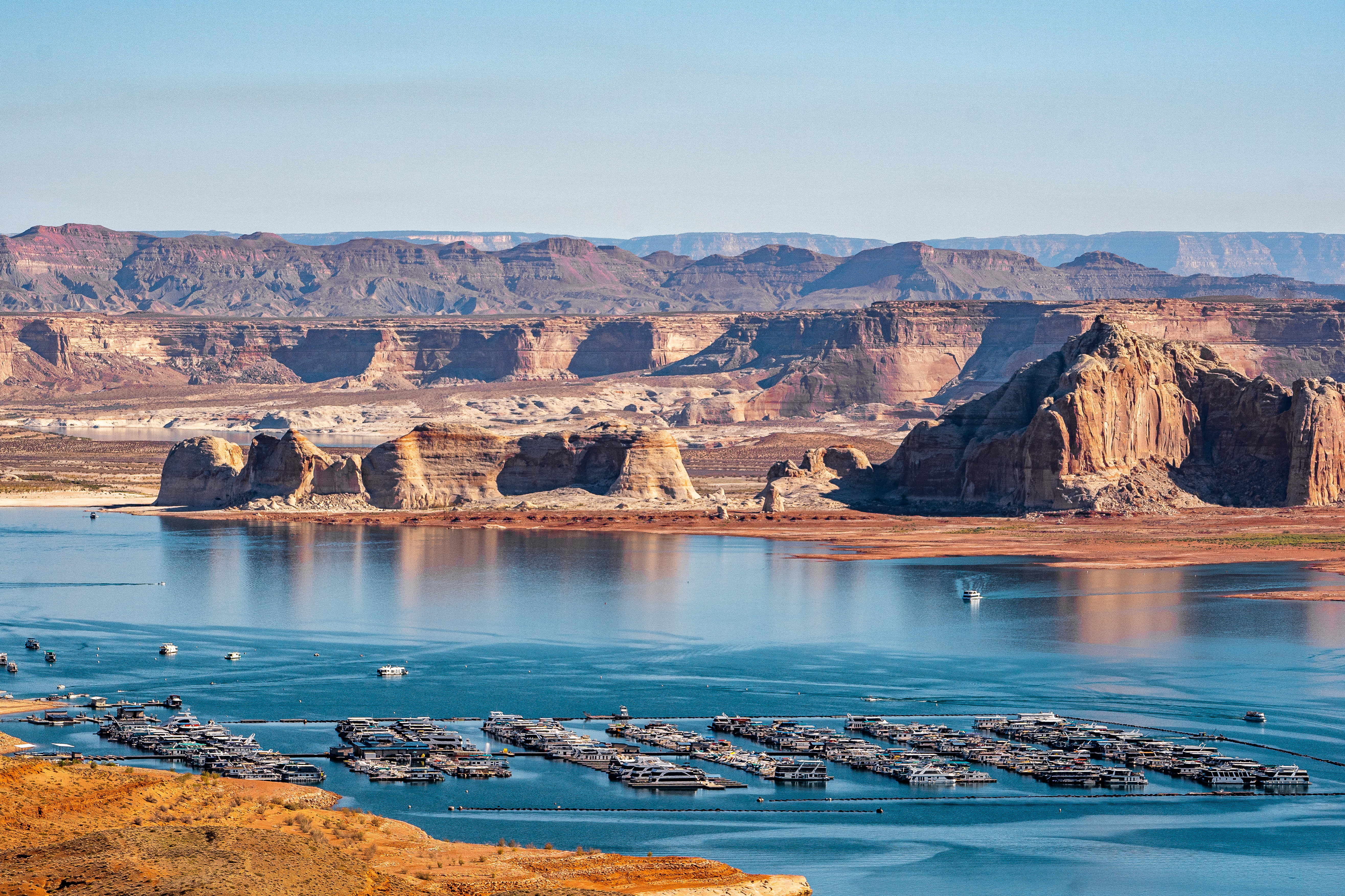 Wahweap Marina on Lake Powell with surrounding rock formations and boats.