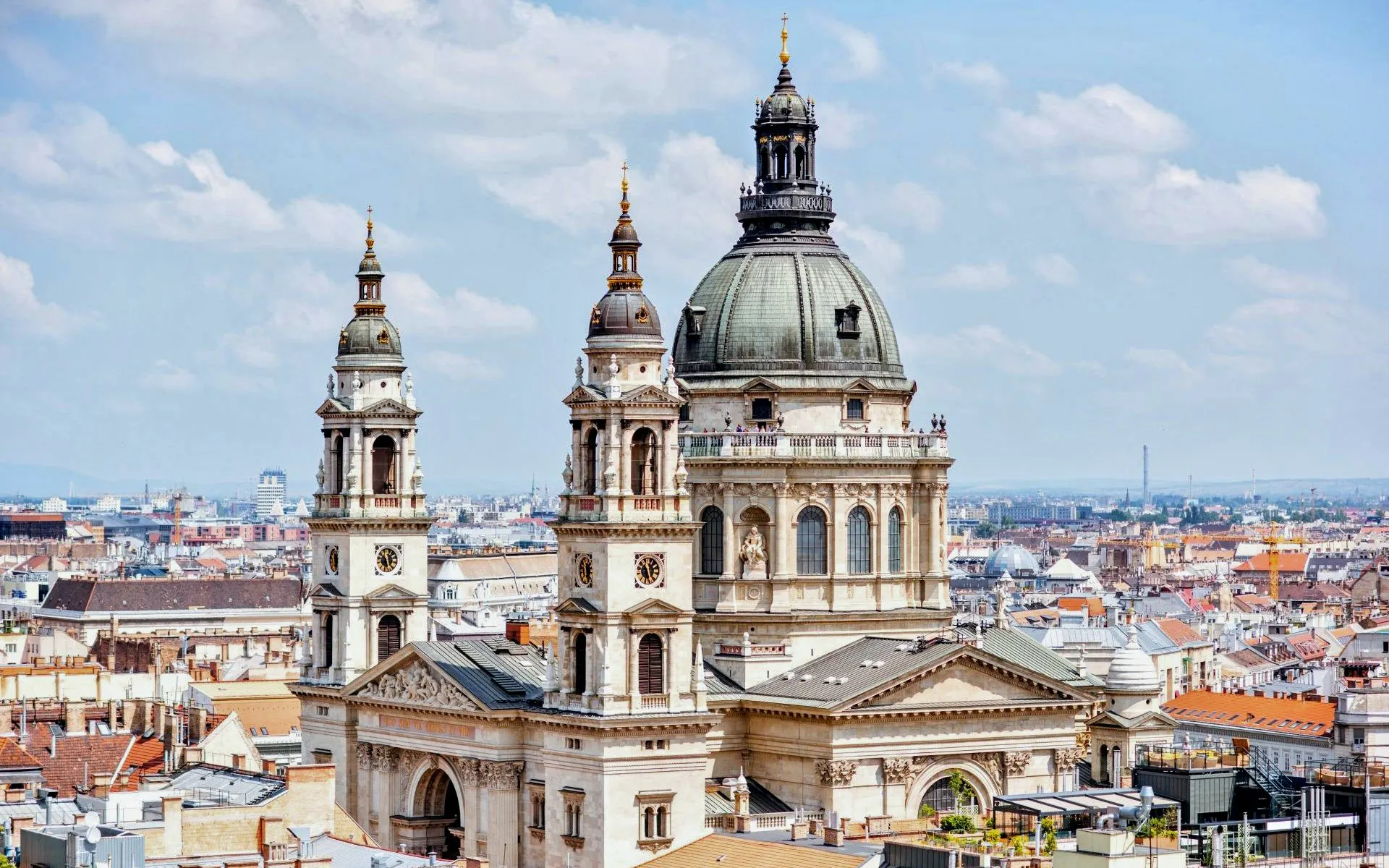 St. Stephen Basilica in Budapest with cityscape in the background.