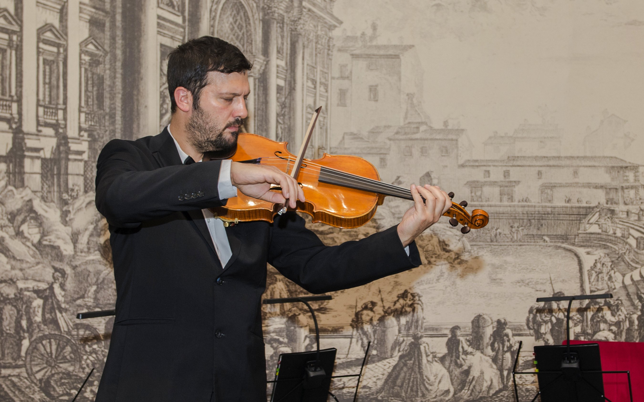 Violinist performing at Opera Concert, Palazzo Poli near Fontana di Trevi, Rome.