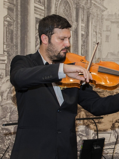 Violinist performing at Opera Concert, Palazzo Poli near Fontana di Trevi, Rome.