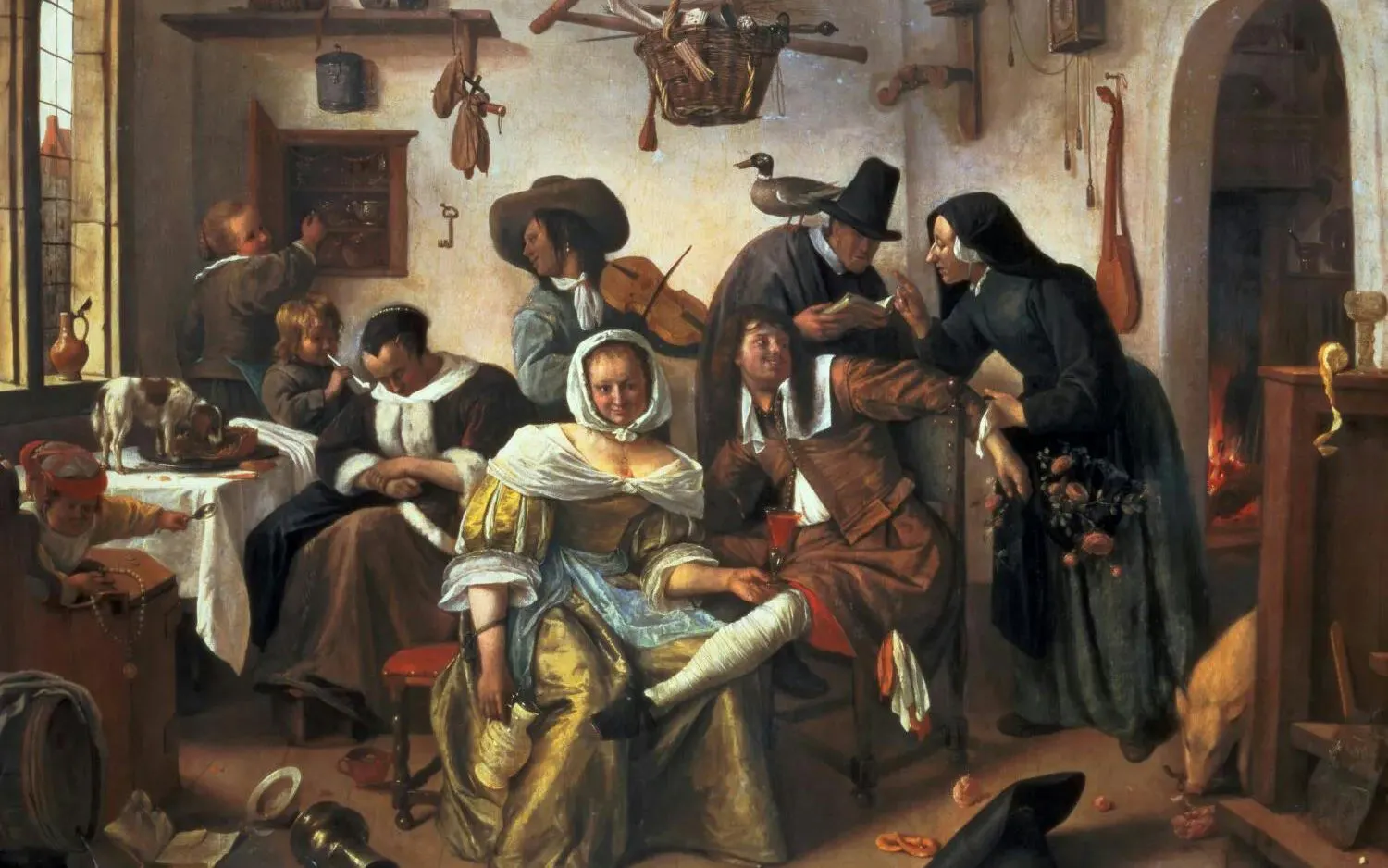 Group of people in a 17th-century Dutch interior scene, Fabrique des Lumières exhibit.