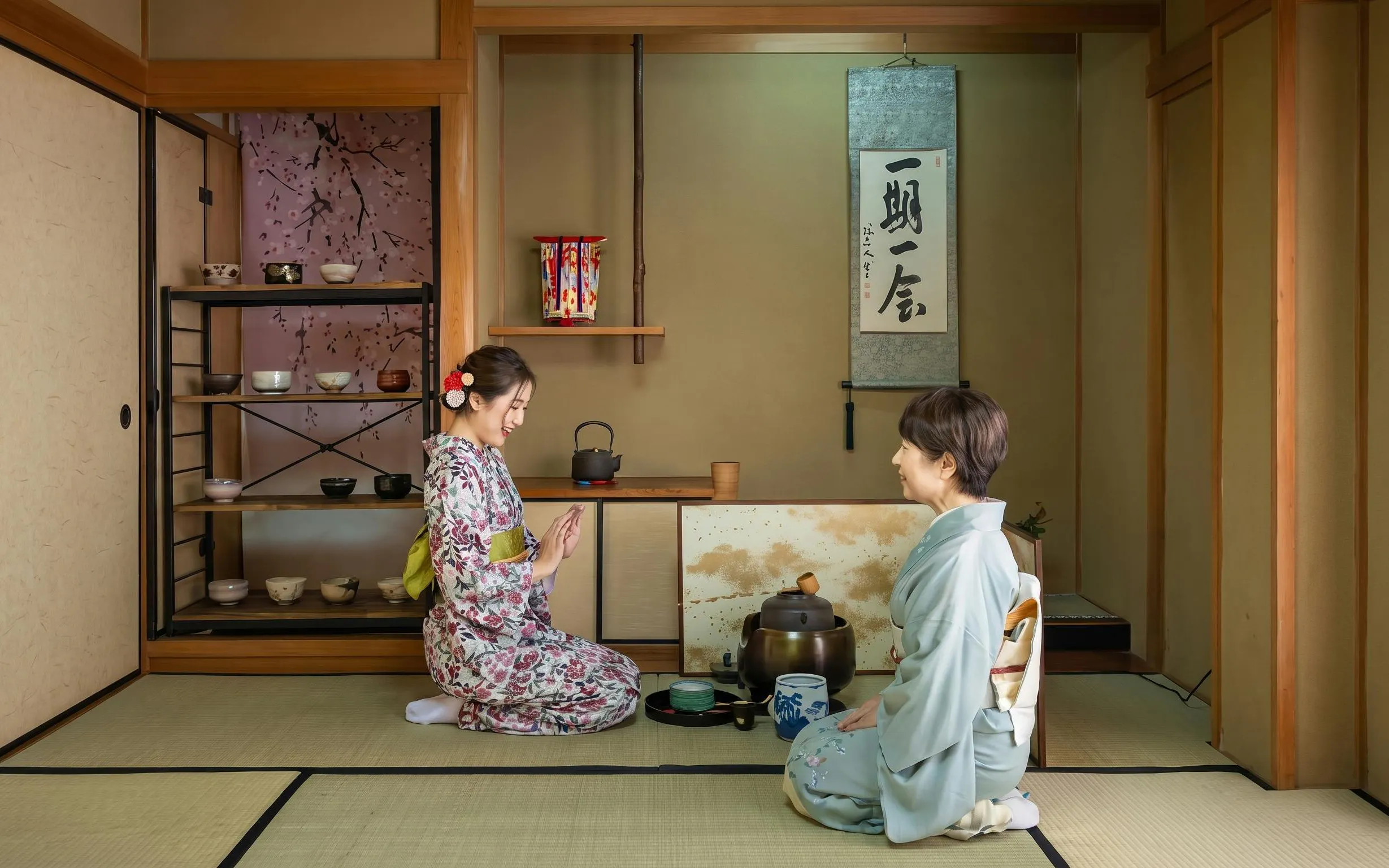 Women participating in a traditional tea ceremony in Kyoto, Japan.