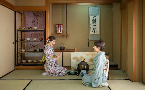 Women participating in a traditional tea ceremony in Kyoto, Japan.