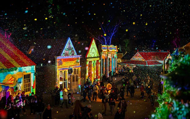 Sovereign Hill Winter Wonderlights festival with illuminated historic buildings and visitors.