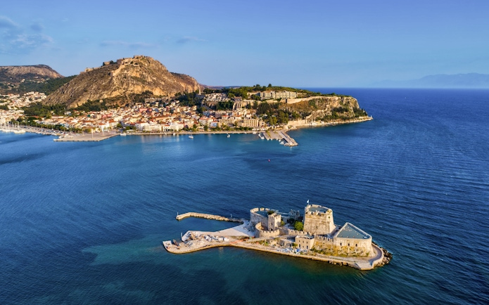Aerial view of Nafplio with Bourtzi Castle in the foreground, Greece.