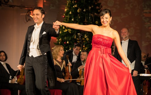 Dancers performing at a concert during the Blue Danube Waltz boat tour.