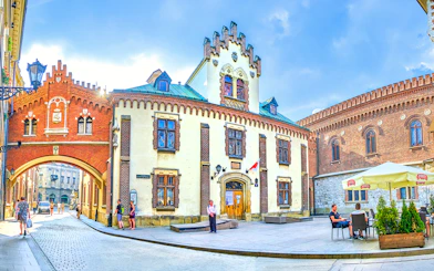 Czartoryski Museum facade with archway and courtyard in Krakow, Poland.