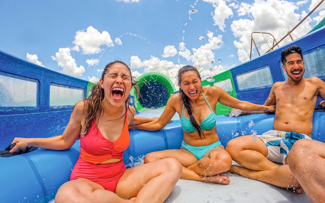 Visitors enjoying a water ride at Aquatica Orlando.
