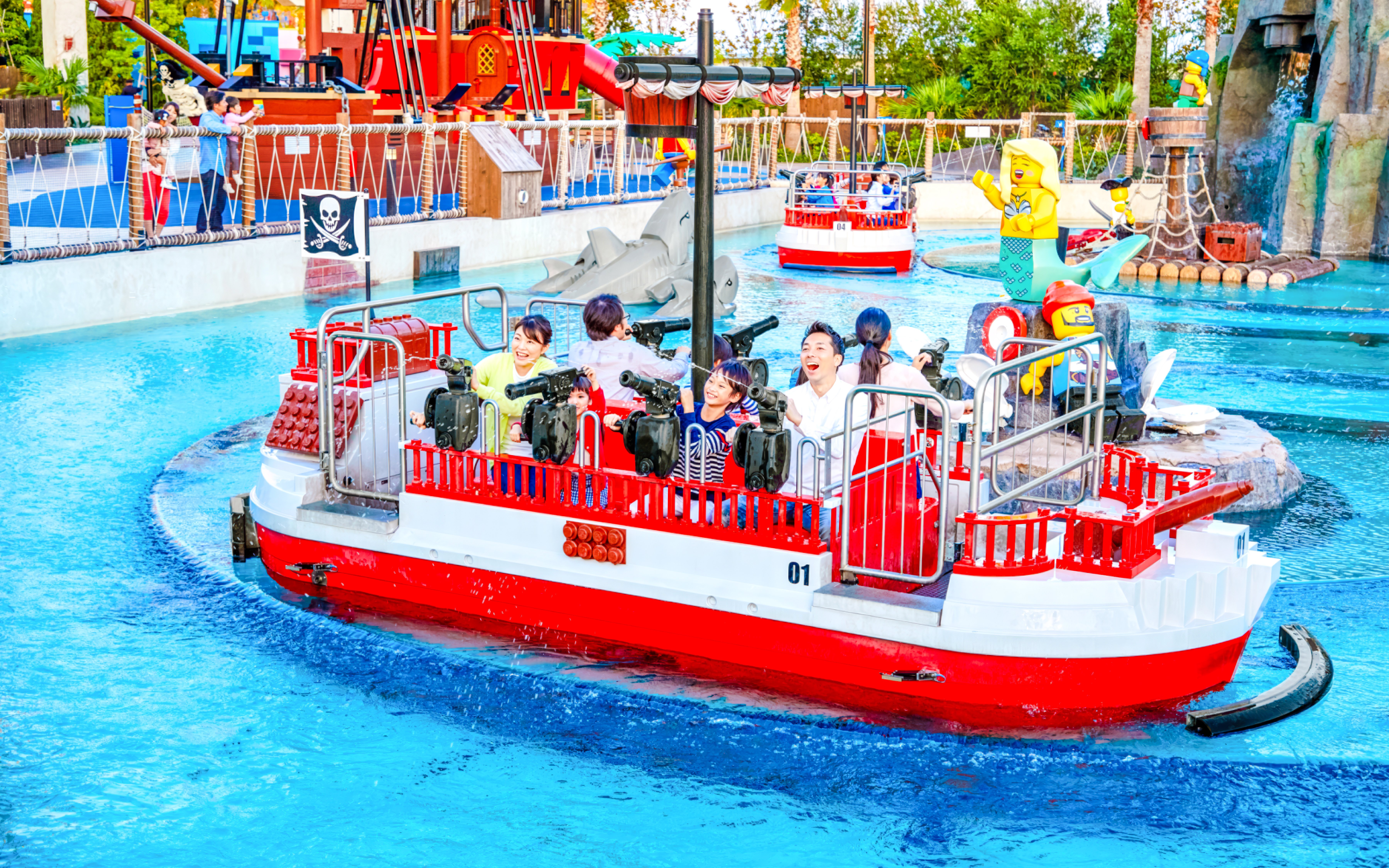 Visitors enjoying a boat ride at LEGOLAND Japan in Nagoya with LEGO pirate theme.