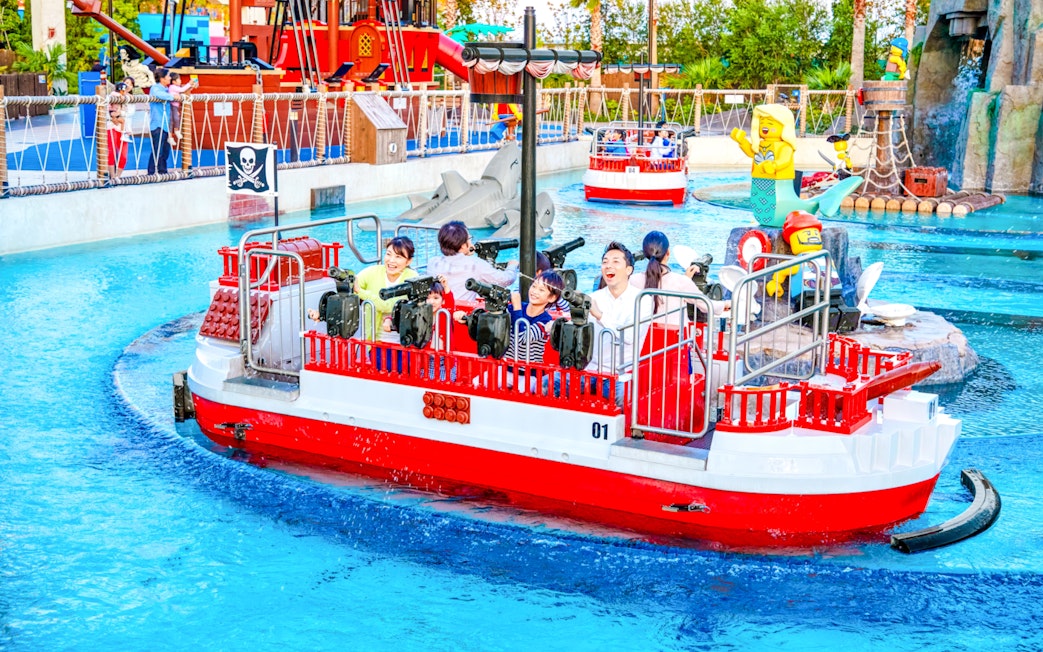 Visitors enjoying a boat ride at LEGOLAND Japan in Nagoya with LEGO pirate theme.