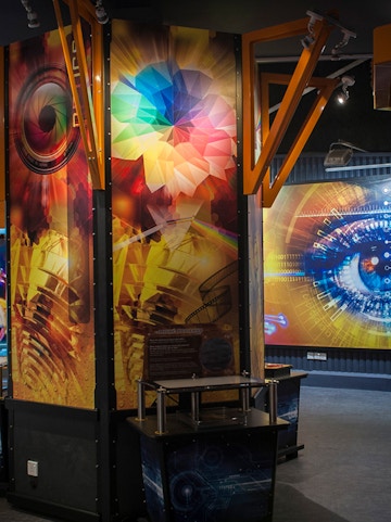 Tech Dome Penang exhibit with colorful geometric patterns and digital displays.