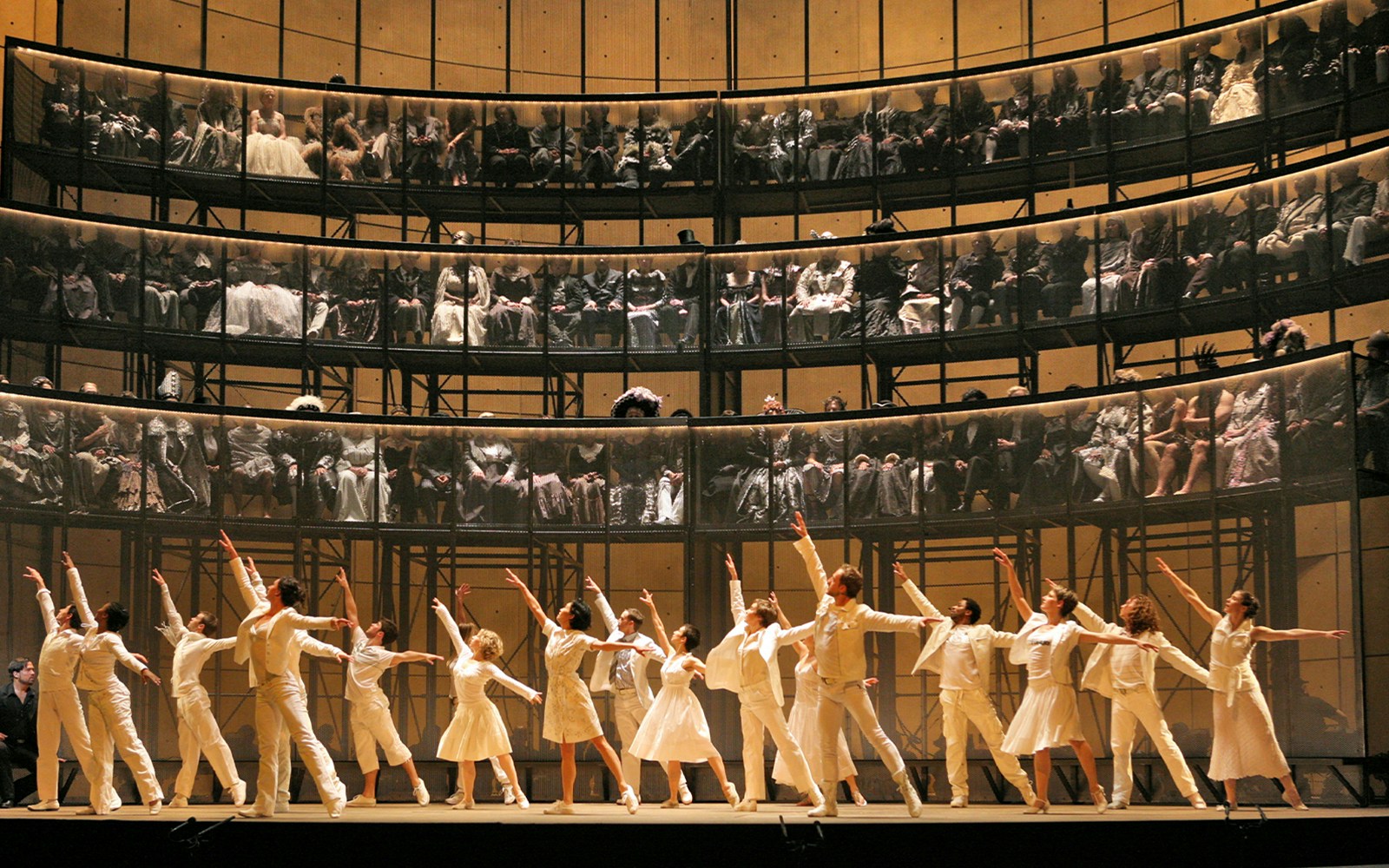 Dancers performing Orfeo ed Euridice on stage with audience in tiered seating.