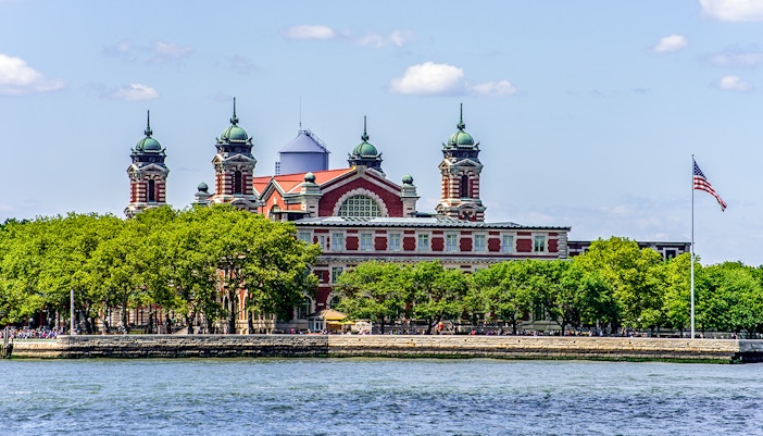 vibrant day tour of Ellis Island, featuring historical landmarks and stunning views, located in New York, USA
